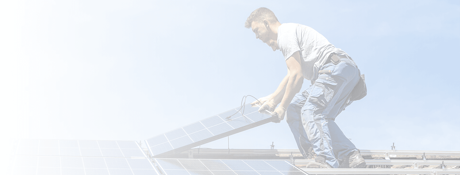 Two men installing a solar system