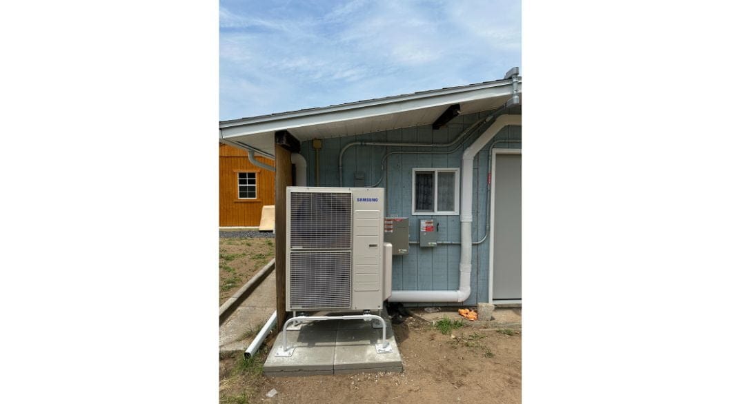 IGS cold-climate heat pump outdoor unit on stand — Ithaca NY install