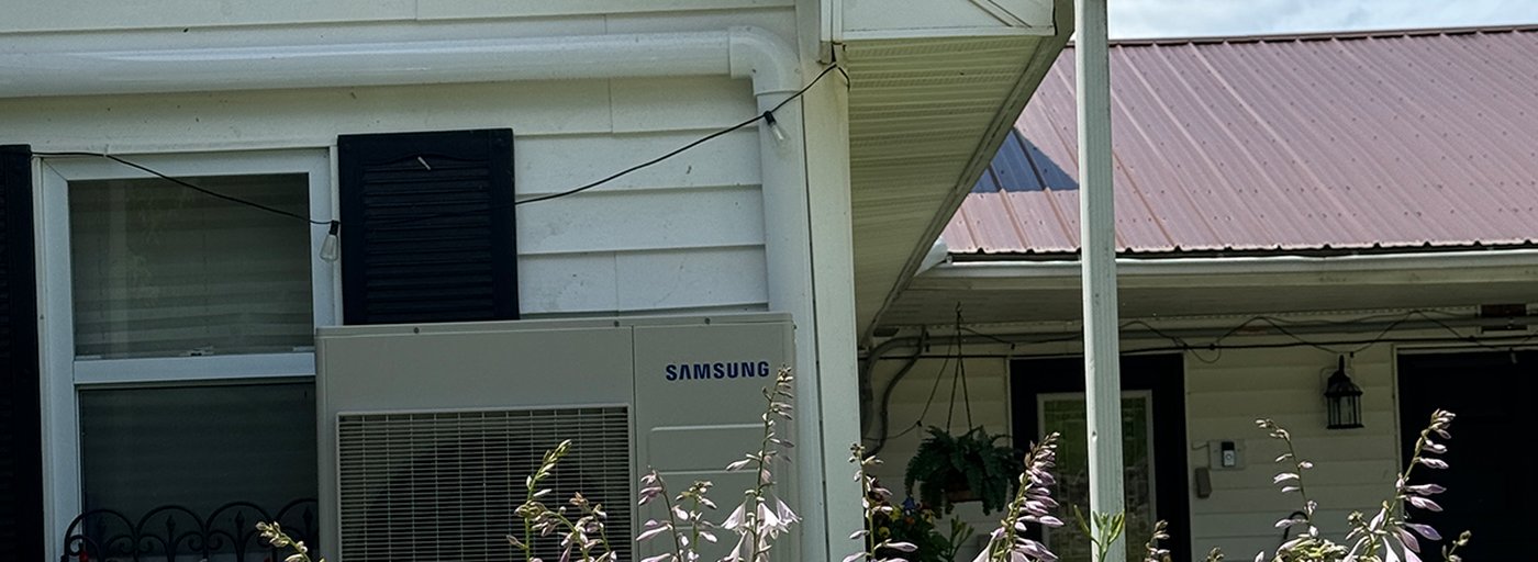 Samsung cold-climate outdoor unit installed at a NY home — qualifies for NYSERDA Clean Heat rebates
